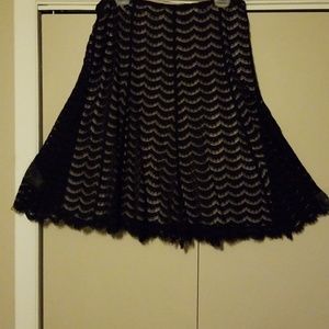 Black skirt with nude under skirt